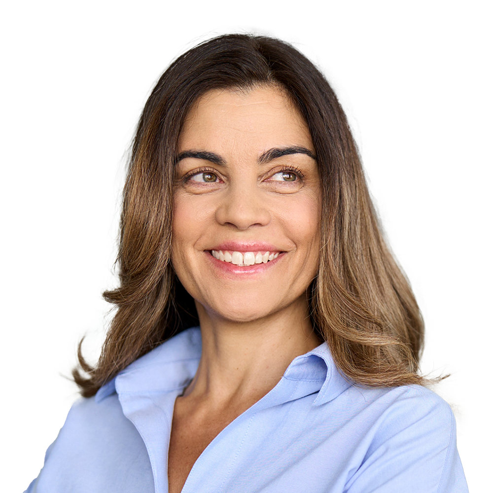 Woman with shoulder length hair smiling and glancing to the left
